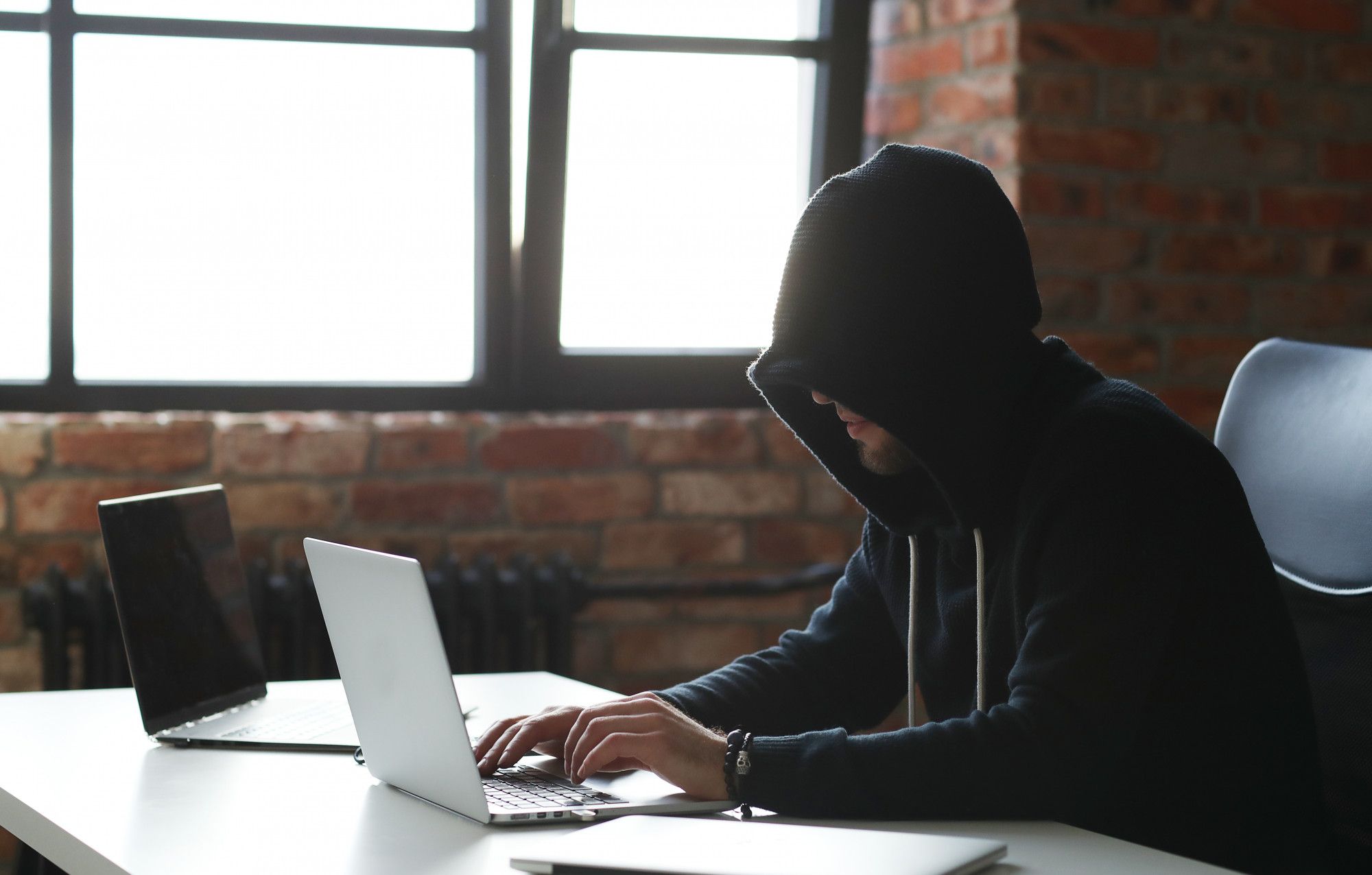 hacker man on laptop