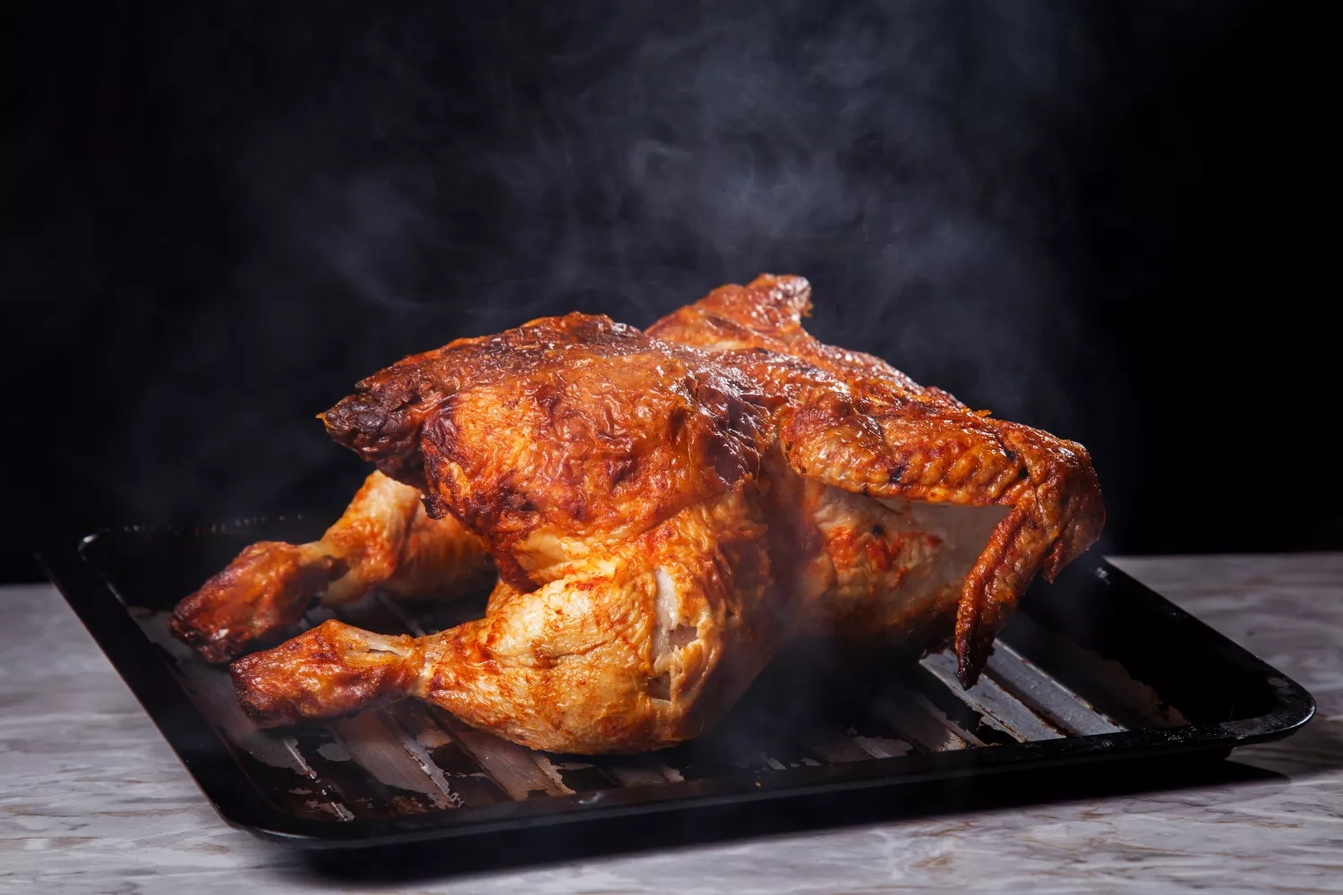 Un pollo a l'ast o asado / FREEPIK