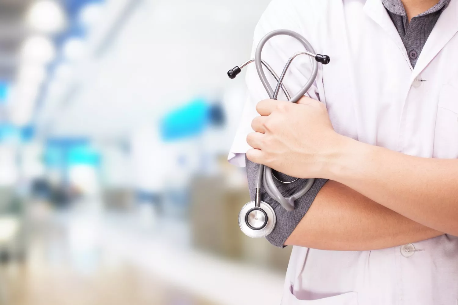 doctor with stethoscope hands hospital background (1)