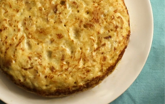 La tortilla de patatas es uno de los platos más aclamados de nuestra gastronomía española /CANVA